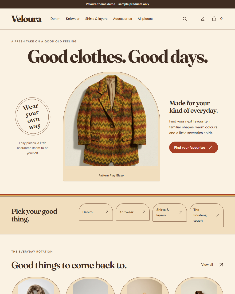 Actual Veloura desktop homepage with arched cover, wardrobe routes and warm product frames.