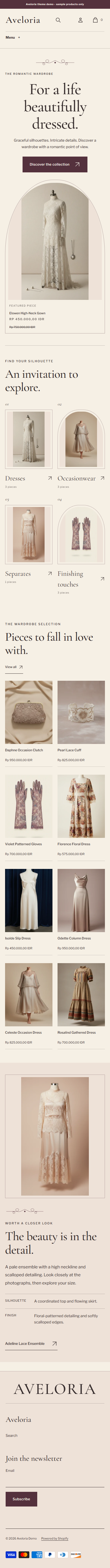 Actual Aveloria mobile homepage with fine-line framing, wardrobe doorways and real garment photography.